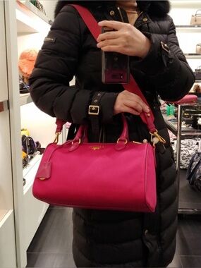 This is a Prada Tessuto Convertible Bauletto Bag in pink nylon with leather trim
